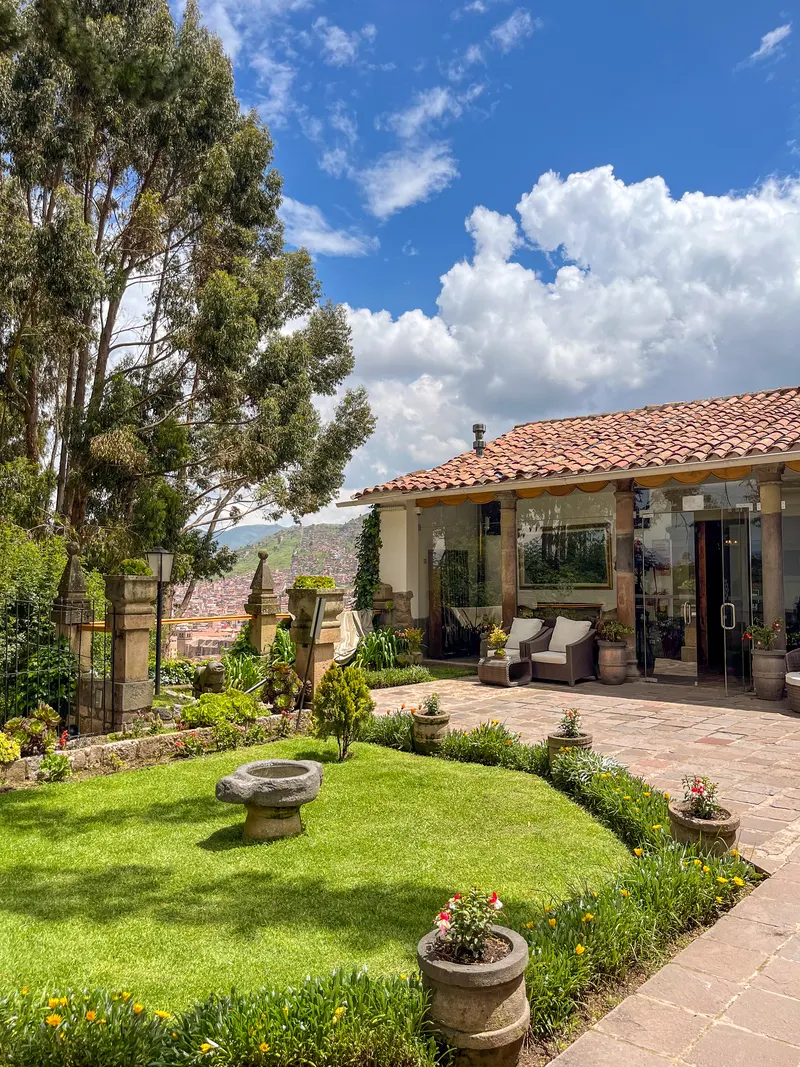 Garden terrace overlooking Cusco at Palacio Manco Capac